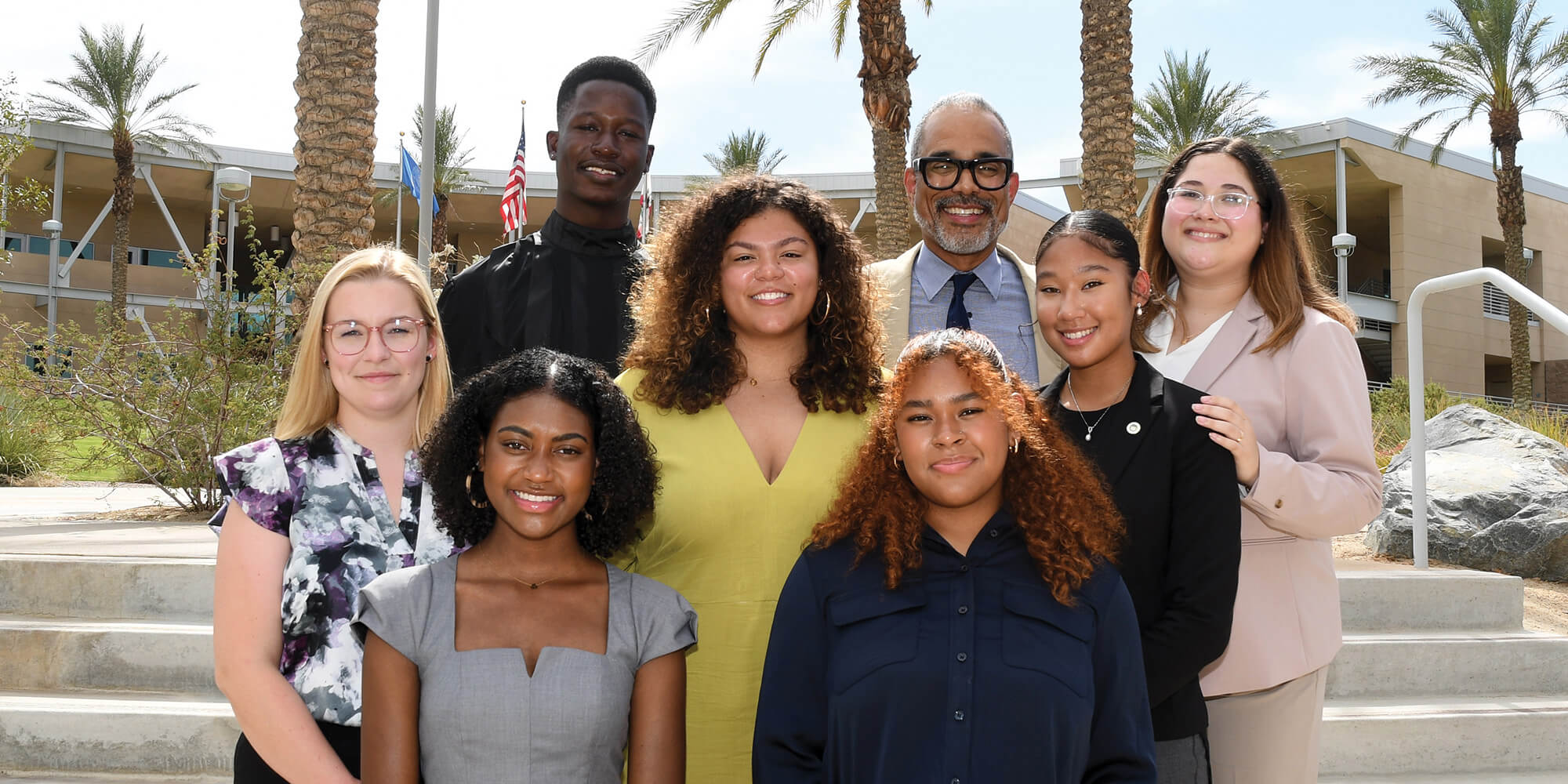Williams (top right) with the seven undergraduate researchers at the UCR Palm Desert campus during the final week of the summer program.