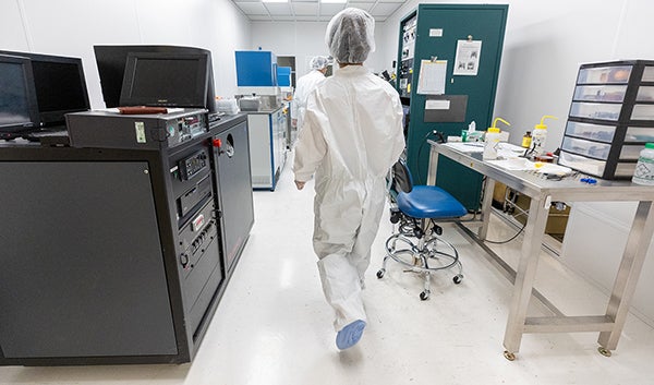 Grad students in the expanded laboratory (Stan Lim/UCR)