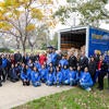 Health, Well-being & Safety staff staff, R'Pantry volunteers, and Stater Bros. representatives in front of donated truck (Stan Lim/UCR)