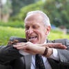 Wilcox holds a chilean rose tarantula while filming the chancellor’s spring message in March 2022.