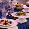 Table setting with salad at the 2025 Gala.