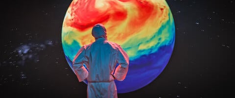 scientist contemplating Earth