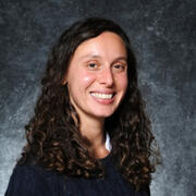 A headshot of Emma Aronson