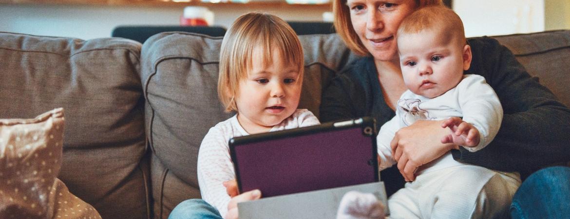 mom and kids on couch
