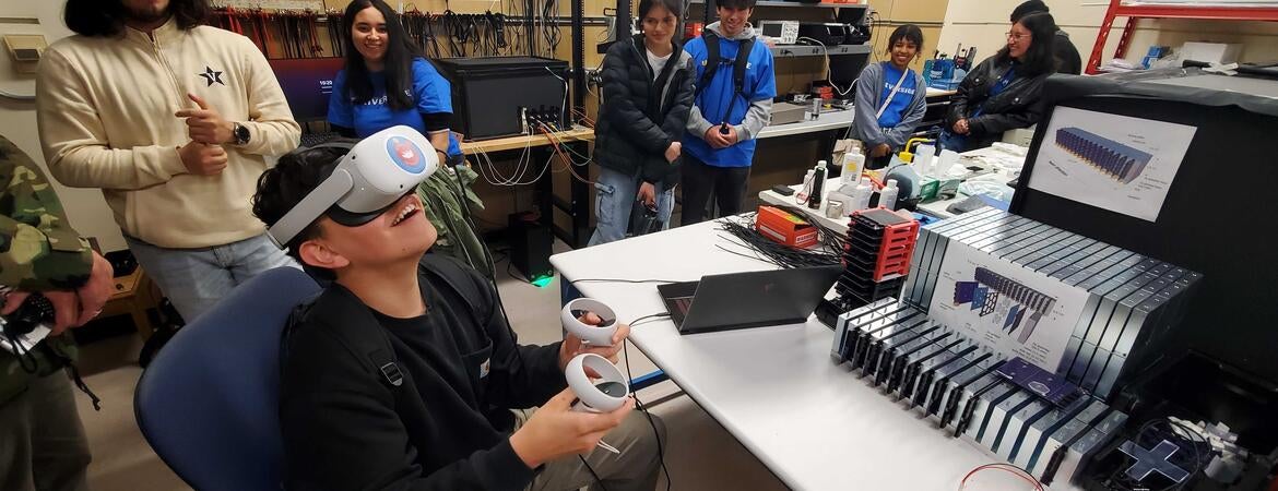 A young student uses virtual reality