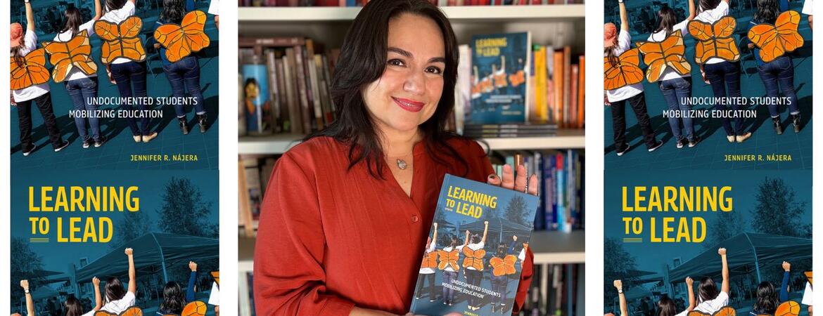 Jennifer Nájera, associate professor of ethnic studies at UC Riverside, holds her new book, Learning to Lead: Undocumented Students Mobilizing Education. (UCR/Sandra Baltazar Martínez)