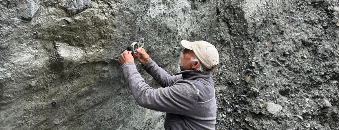 Measuring scratches on the Alpine Fault.