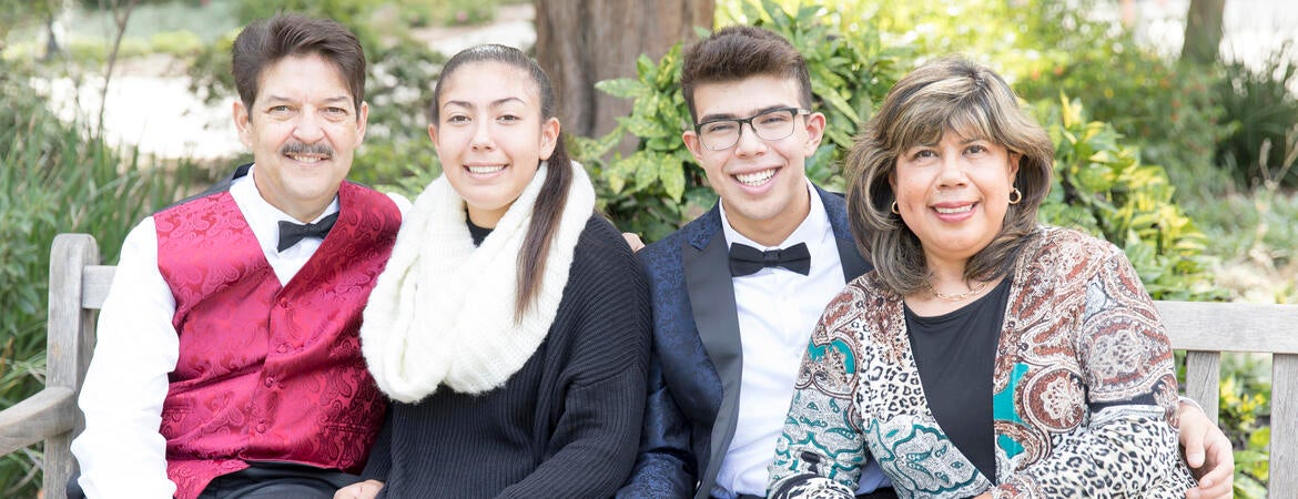 Joshua Tejada with his parents and sister.