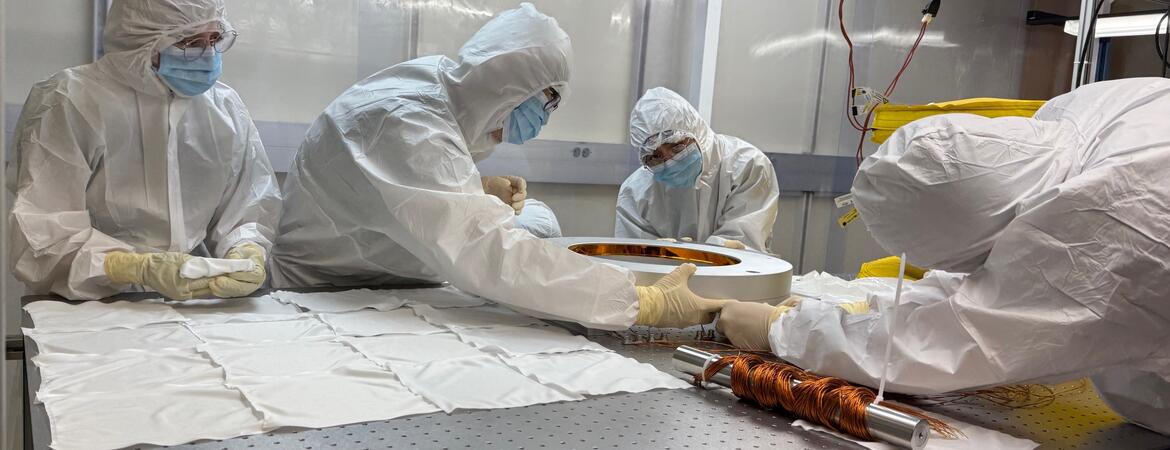 Students disassemble an instrument