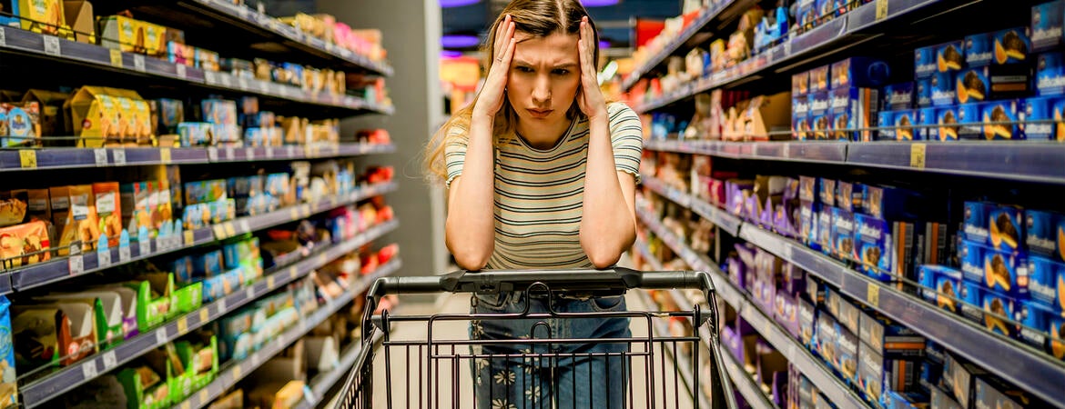Stock photo of a stressed shopper