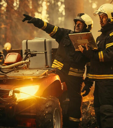 Firefighters with laptop