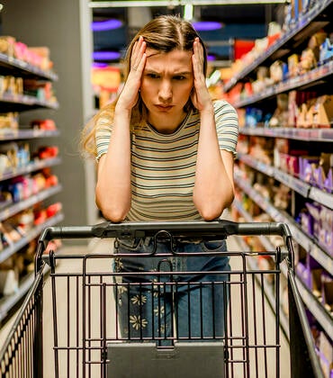 Stock photo of a stressed shopper