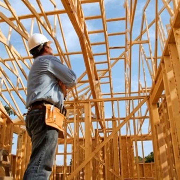 A photo of a house being built.