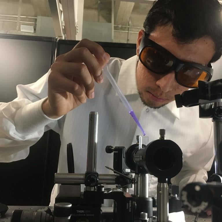 Vicente Robles performing optical cavitation experiments