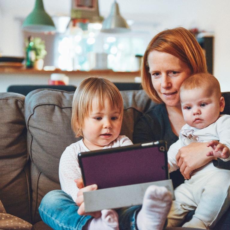 mom and kids on couch