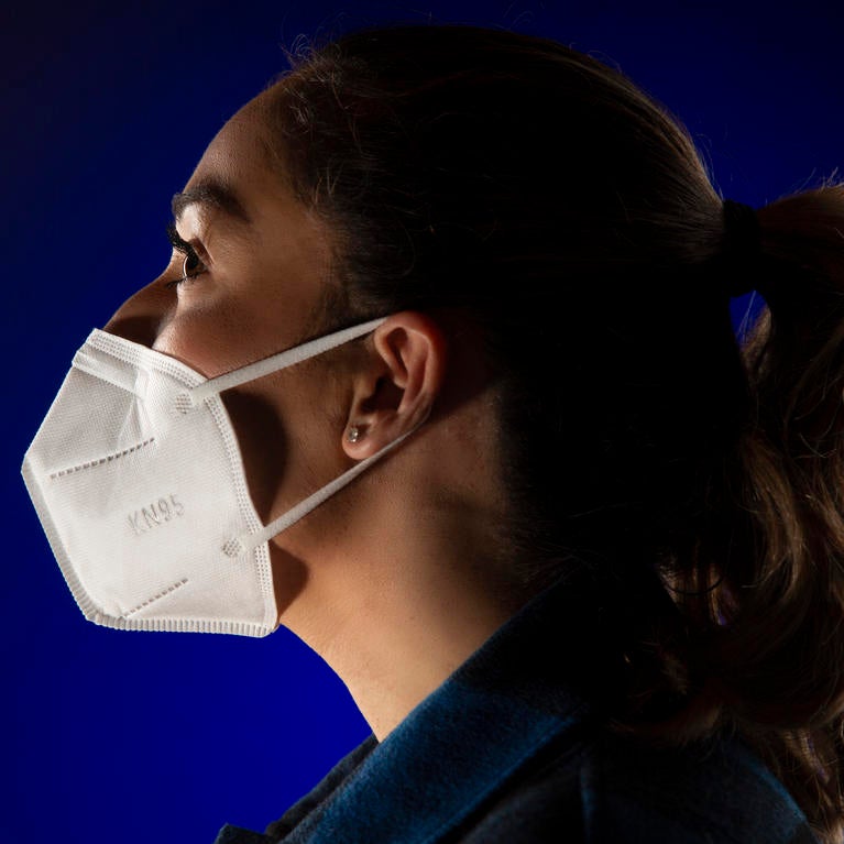 Student wearing KN95 mask.