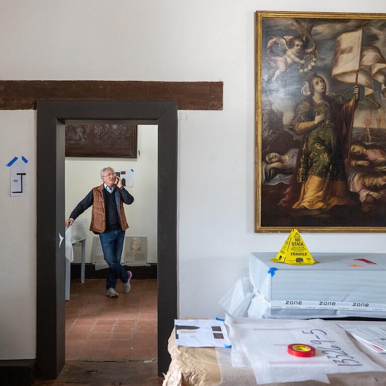History professor Steven Hackel is the lead curator of the new exhibition at Mission San Gabriel Museum in San Gabriel. He walked through the exhibition installation on May 26, 2023. (UCR/Stan Lim)