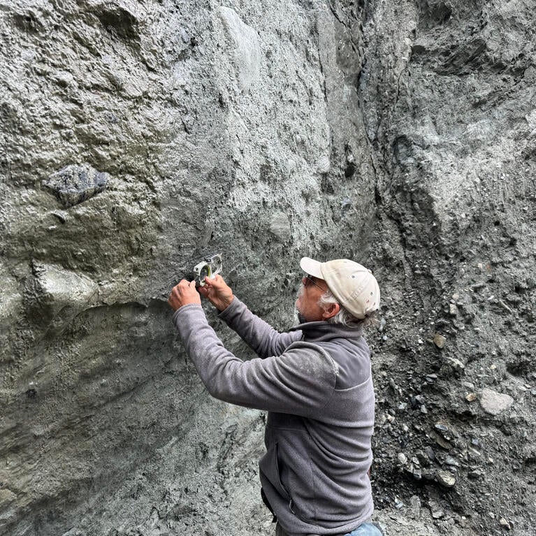 Measuring scratches on the Alpine Fault.