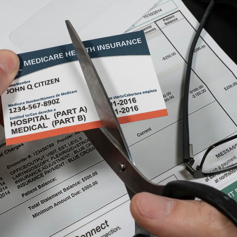 Man cuts fake Medicare card
