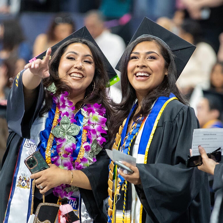 UCR graduates at commencement wearing their philanthropy cord