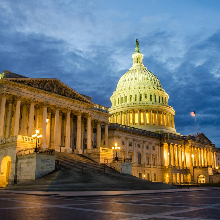 The U.S. Capitol lit up at night.