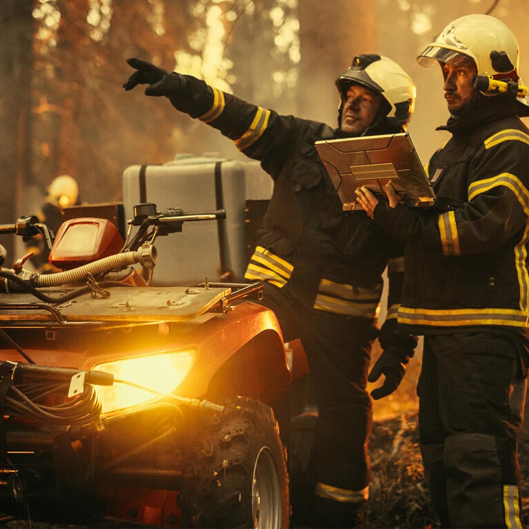 Firefighters with laptop