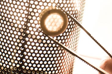 A transparent ceramic cap welded to a ceramic tube