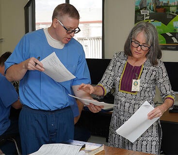 Tanya Nieri with student at Norco CRC student