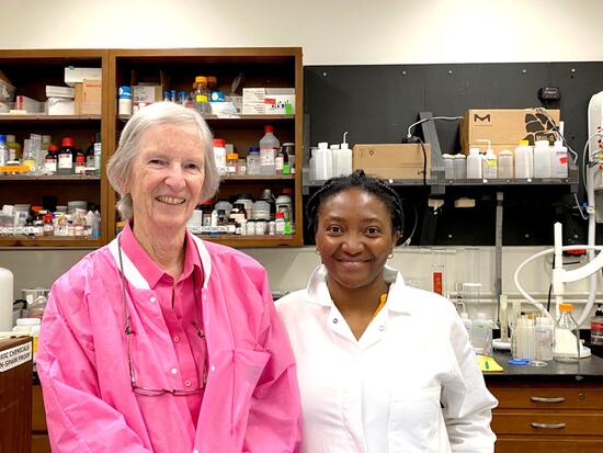 Prue Talbot and Esther Omaiye in the lab