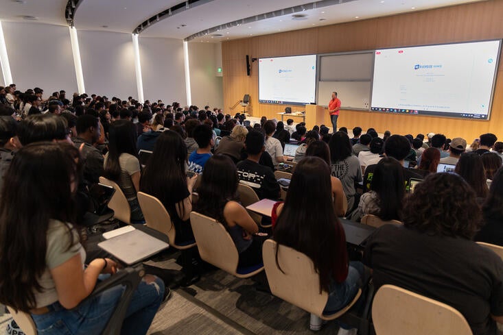 class in new School of Business auditorium