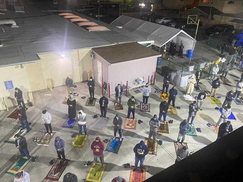 Some community members gathered for prayer, observing social distancing and wearing face masks. (Photo courtesy of Batool Abdaljawad)