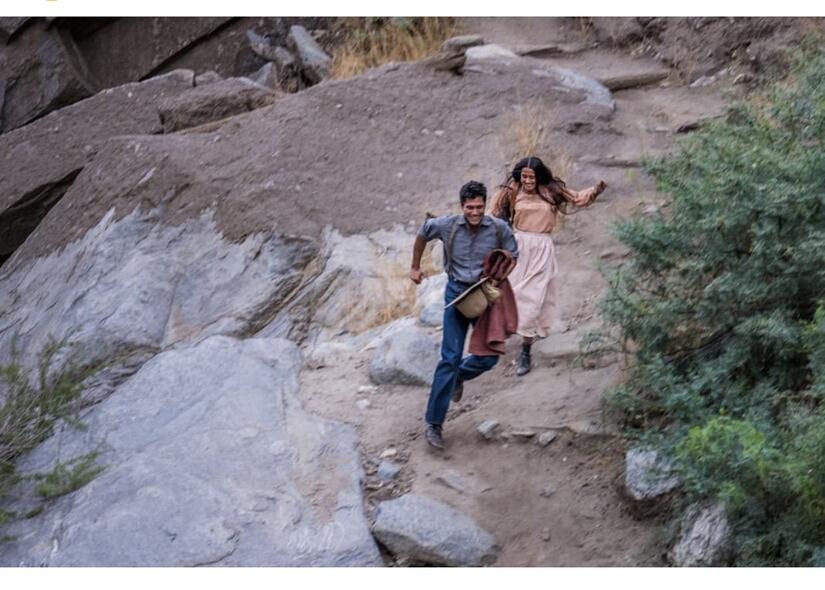 A scene from "The Last Manhunt" where actors Martin Sensmeier (Willie Boy) and Mainei Kinimaka (Carlota) attempt to elope. (Photo courtesy of Jason Momoa's Instagram)