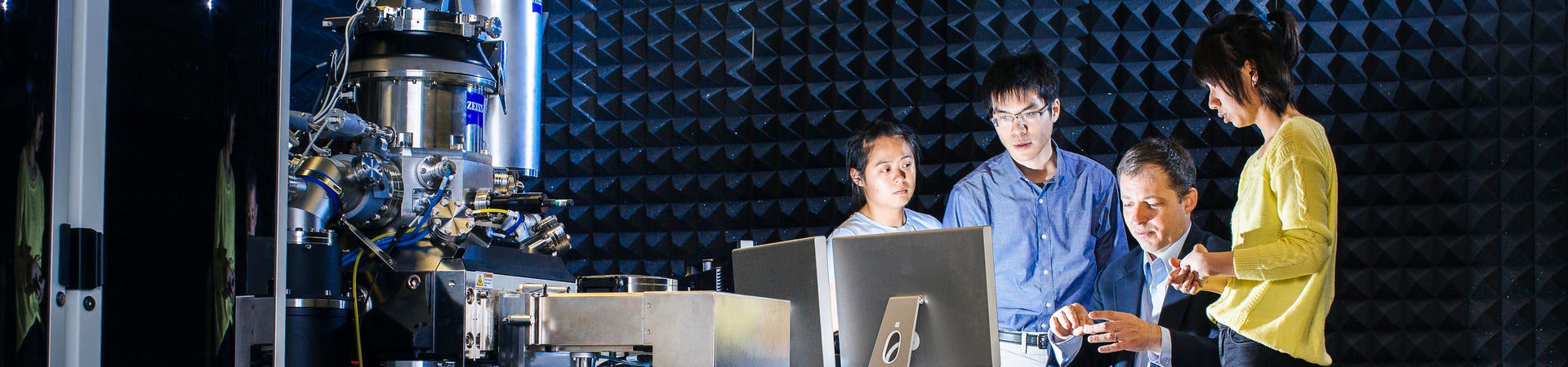 Students and profossor discussing results