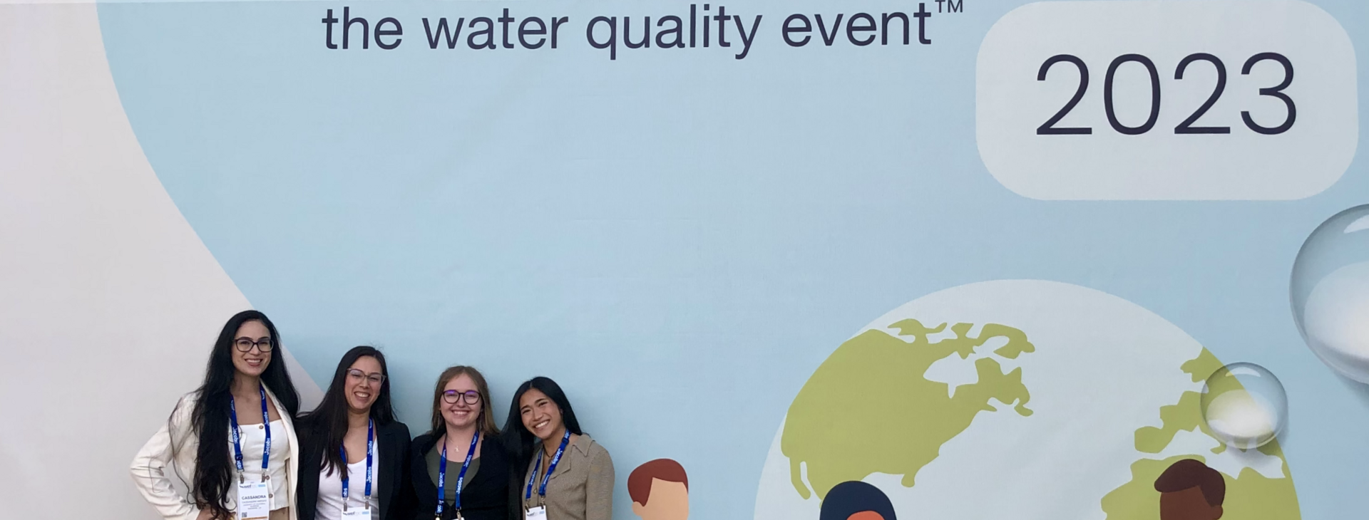 Senior Design Team at WEFTEC by sign