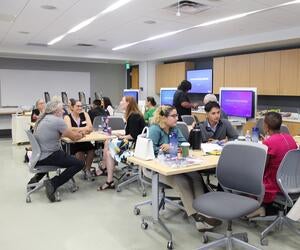 students meeting with the instructors