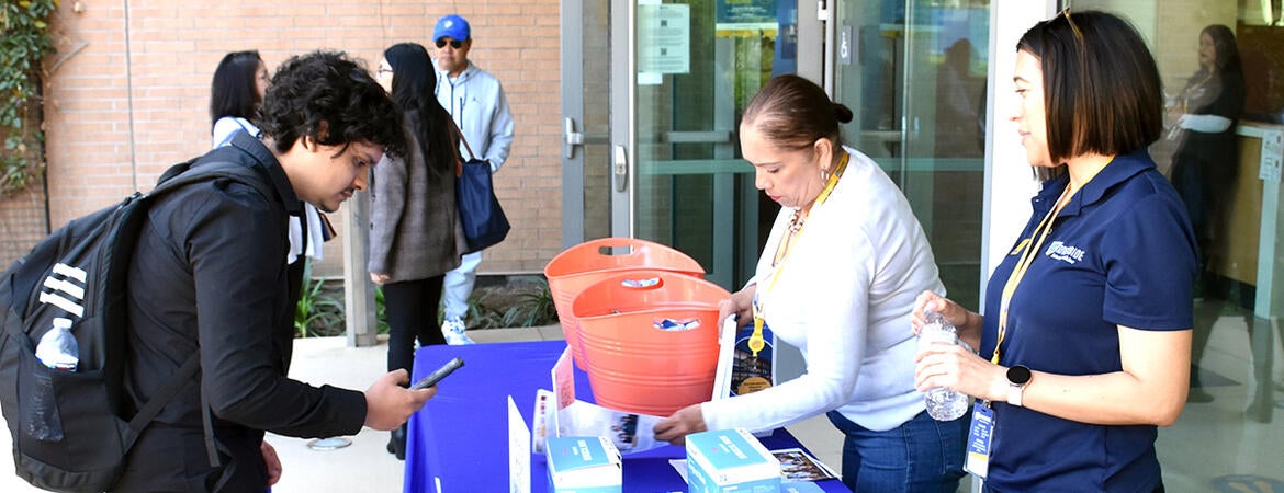 Check in table at Open House 2023
