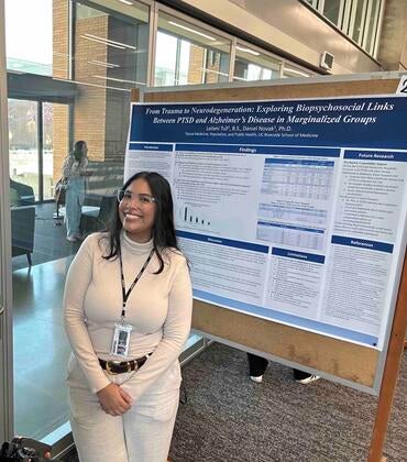 Dr. Novak and Leilani Tull with her research poster