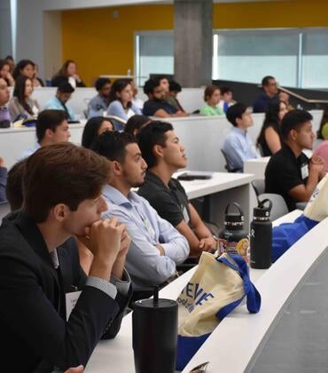 Students sitting at SOM orientation 2024