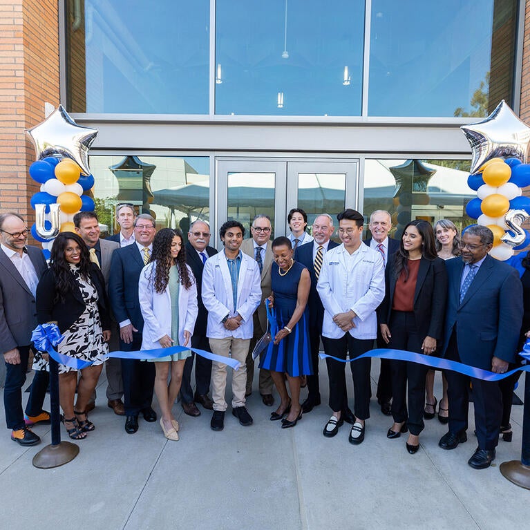 Dean Deas cuts the ribbon to open Ed II