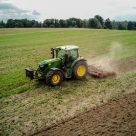 A tractor in a farm field