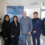 Group Photo of Dr. Bradley Franklin with Students and Dean