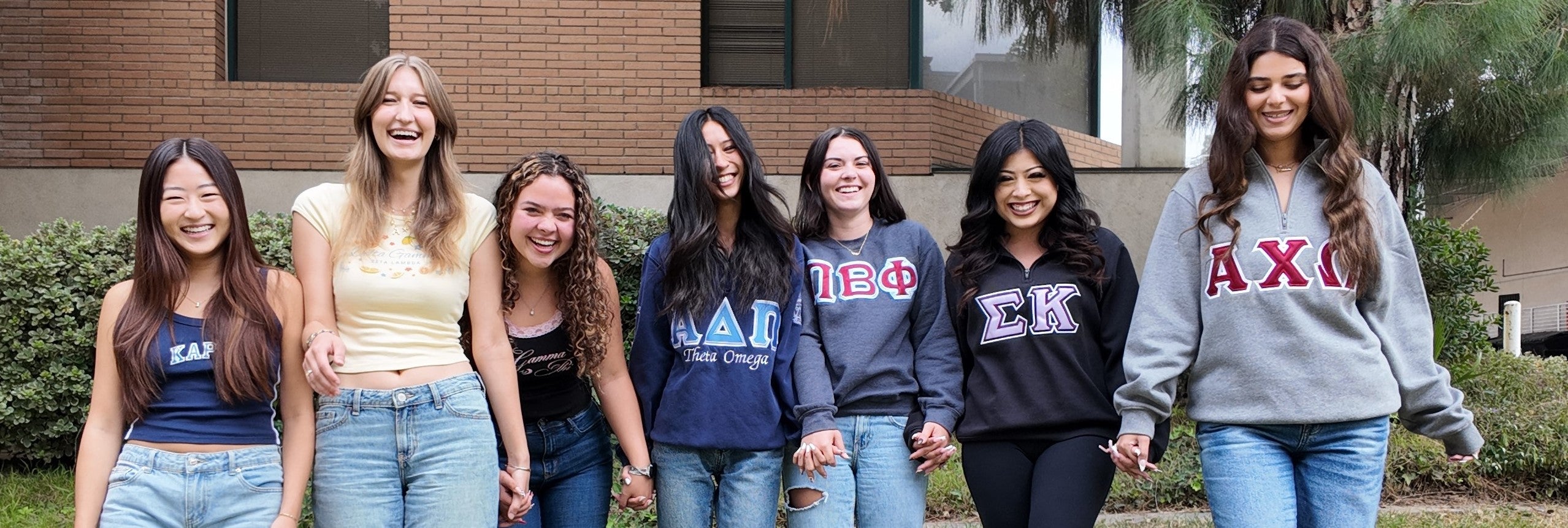Panhellenic Delegates holding hands