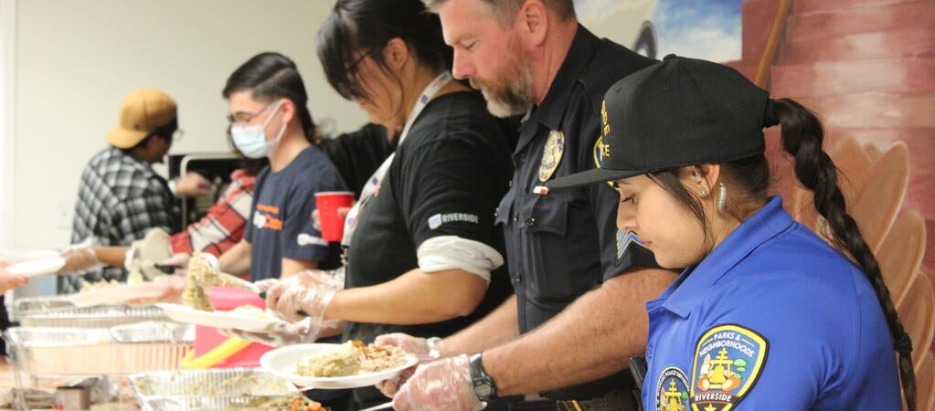 policewoman serving food