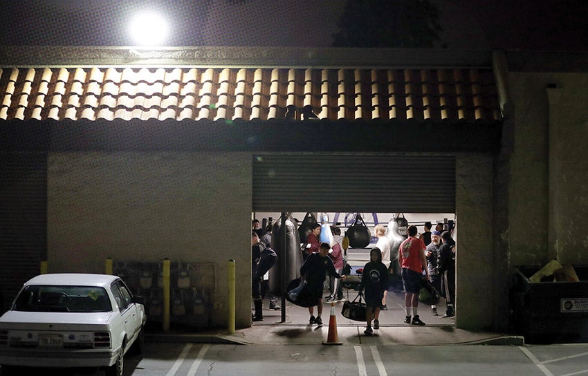 Boxers arrive at Riverside’s Raincross Boxing Academy on Jan. 21.