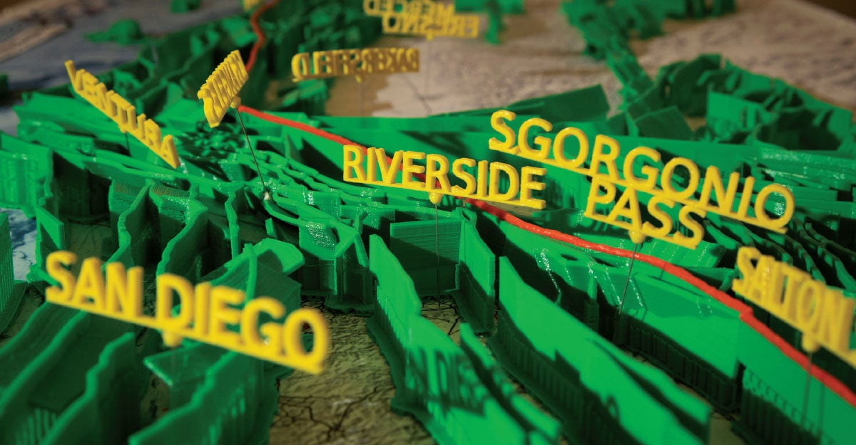 Photo of a 3D printed map showing multiple fault lines in Southern California