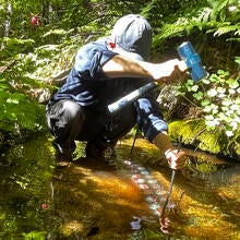 Intern working on stream algal growth
