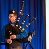 UC Riverside Pipe Band performing on stage.