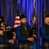 UC Riverside Pipe Band performing on stage.