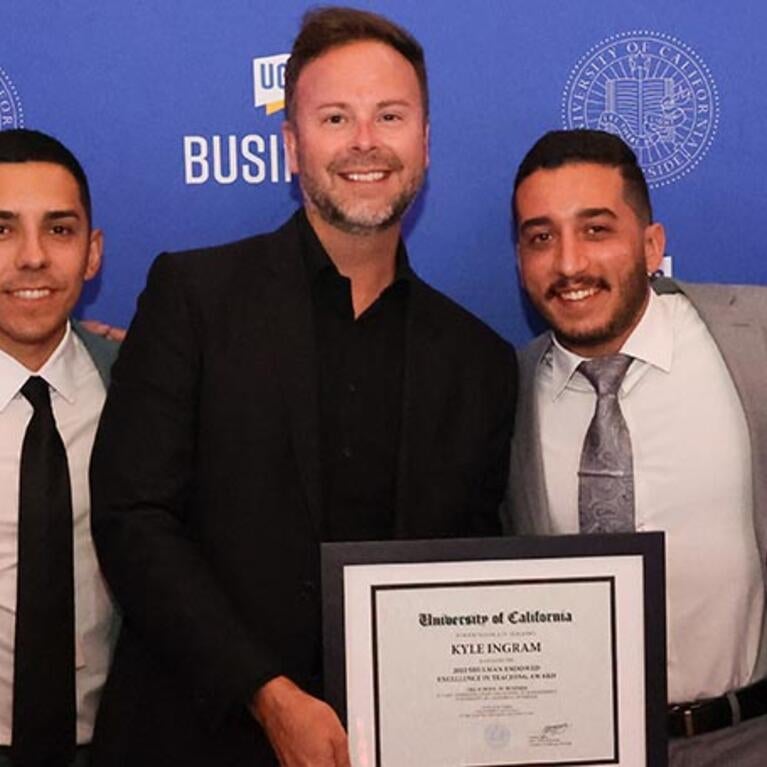 Kyle Ingram with students