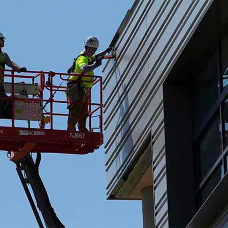 Construction workers on UCR campus